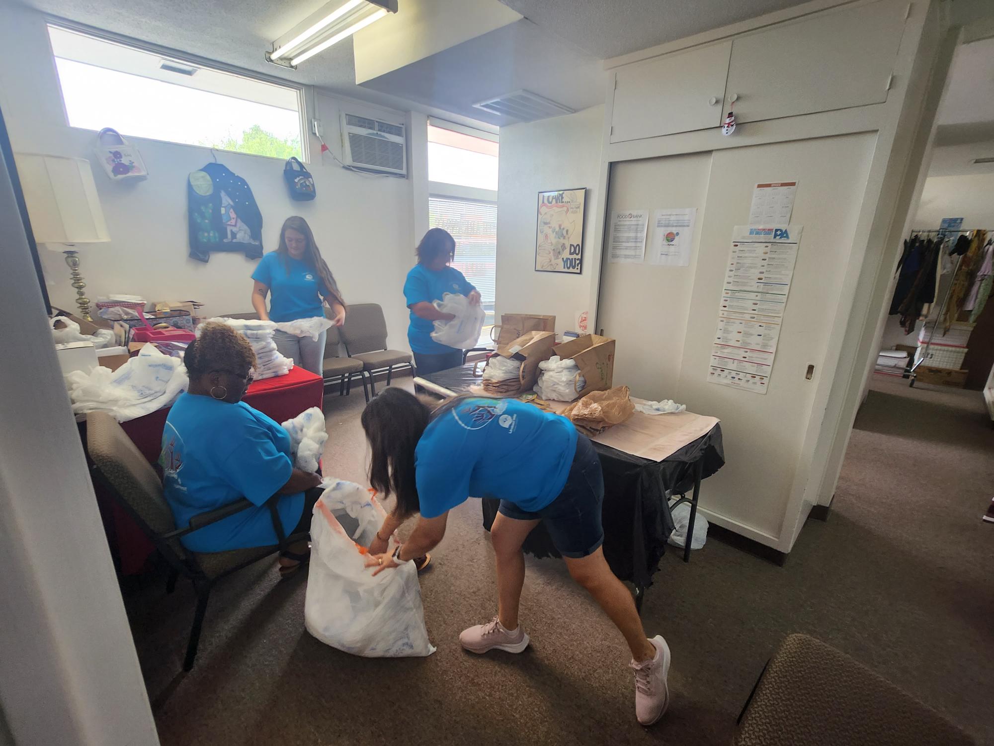 Melondy Hamilton, Yessica Marquez Lexi Hicks, and Brenda Stanley from Simmons Bank volunteered on September 07, 2023 for Celebration of Caring.